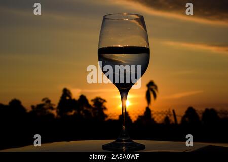beautiful sunset reflecting in the crystal bowl Stock Photo