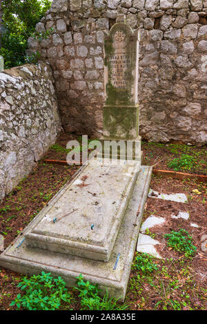 Graves in the cemetery at St Stephen Church, Zaton, Dalmatian Coast, Croatia Stock Photo