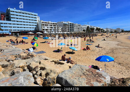 Summer view over Quarteira beach, Vilamoura town, Algarve, Southern Portugal, Europe Stock Photo