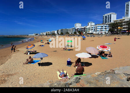 Summer view over Quarteira beach, Vilamoura town, Algarve, Southern Portugal, Europe Stock Photo