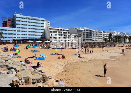 Summer view over Quarteira beach, Vilamoura town, Algarve, Southern Portugal, Europe Stock Photo