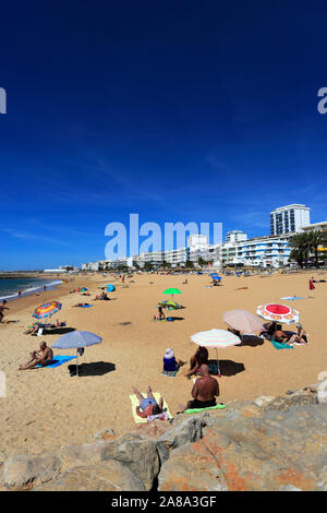 Summer view over Quarteira beach, Vilamoura town, Algarve, Southern Portugal, Europe Stock Photo