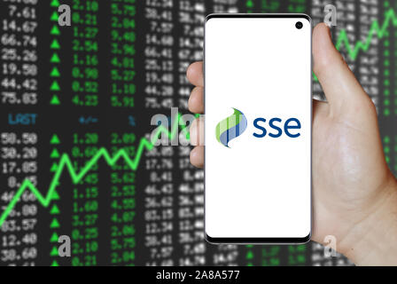 Logo of public company SSE plc displayed on a smartphone. Positive stock market background. Credit: PIXDUCE Stock Photo