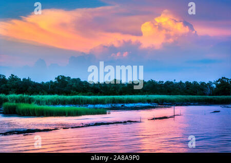 The sun sets over Mobile Bay at Helen Wood Park, Sept. 6, 2014, in Mobile, Alabama. Stock Photo