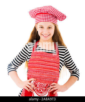 Little girl in red chef uniform smiles Stock Photo