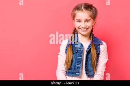 Smiling teen girl with braided hair Stock Photo