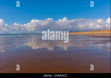 The beach at Harlech North Wales with the Llyn Peninsular in the distance Stock Photo