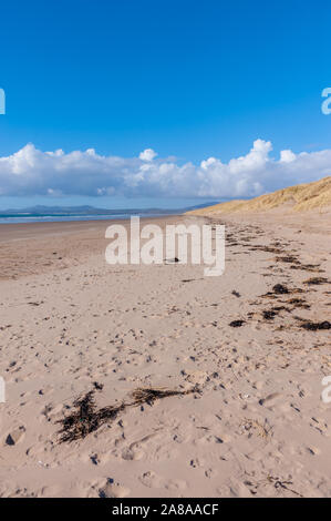 The beach at Harlech North Wales with the Llyn Peninsular in the distance Stock Photo