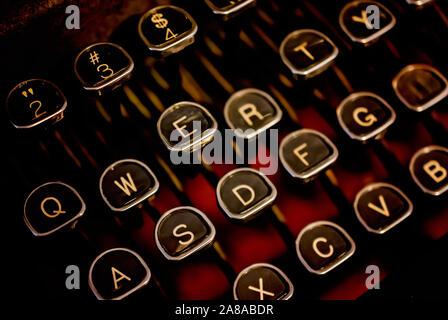The glass-topped keys of a vintage 1940s Royal KMM typewriter are pictured at the  Pensacola Lighthouse and Museum in Pensacola, Florida. Stock Photo