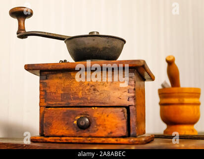 A vintage coffee grinder is displayed at the  Pensacola Lighthouse and museum, Oct. 27, 2019, in Pensacola, Florida. Stock Photo