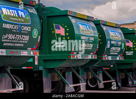 CNG-powered (compressed natural gas) Mack trucks line up at Waste Pro’s time-fill station, March 19, 2016, in Jacksonville, Florida. Stock Photo