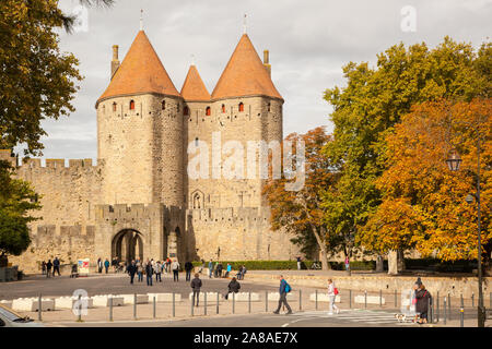 The entrance to the hill top medieval castle Citadel in the fortified French city  town of Carcassonne in the Languedoc region of France during Autumn Stock Photo