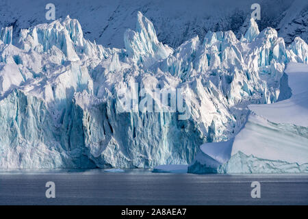 The terminus of the Monaco Glacier in Woodfjorden in the Svalbard Islands (Spitsbergen) in the high Arctic. Stock Photo