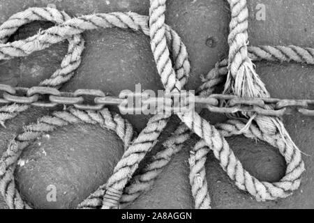 Mooring rope and rusty vhain image Stock Photo