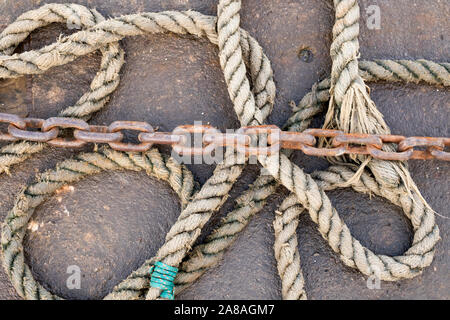 Mooring rope and rusty vhain image Stock Photo