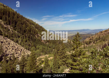 View of mountains and valleys near Fish Creek Falls in Colorado Stock Photo