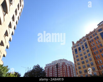 Brick buildings in a city on a nice day Stock Photo