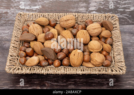 Mixed nuts in a basket Stock Photo