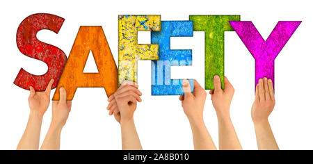 people holding up colorful rainbow wooden letter with words Safety isolated on white background. security danger internet caution protection business Stock Photo