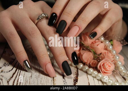 Closeup photo of a beautiful female hands with elegant manicure Stock Photo