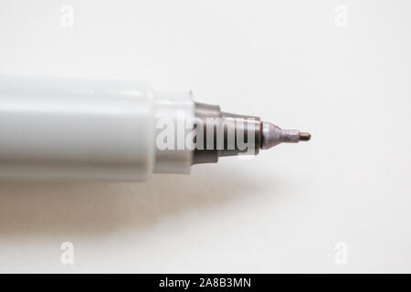 Pen point close-up on white background - Image Stock Photo