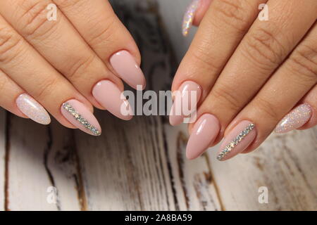 Perfect manicure and natural nails. Attractive modern nail art Stock Photo  - Alamy