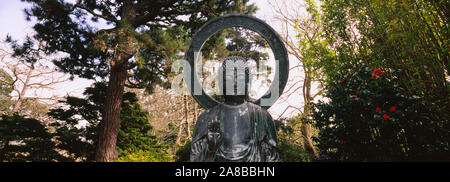 Statue of Buddha in a park, Japanese Tea Garden, Golden Gate Park, San Francisco, California, USA Stock Photo