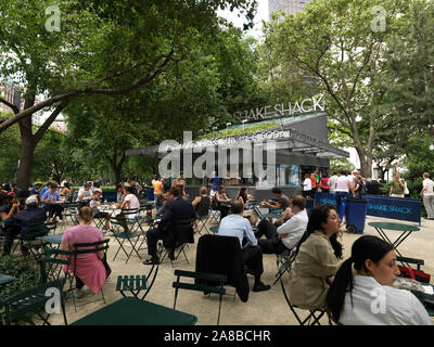 Group of people sitting in a restaurant, Shake Shack, Madison Square, intersection of 24th street and Madison Avenue, Manhattan, New York City, New York State, USA