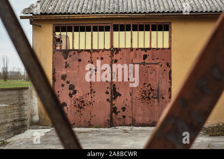 Door in rusty iron and corroded by time Stock Photo
