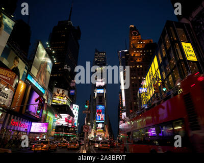 Buildings in a city lit up at dusk, Times Square, Manhattan, New York City, New York State, USA Stock Photo