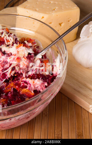 Salad with beets, grated cheese, carrots, garlic and mayonnaise Stock Photo