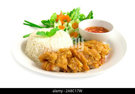 Hainanese crispy fried chicken rice with soya sauce decorate cucumber carved fusion food Chinese and Thai mix style the best food popular in Thailand Stock Photo