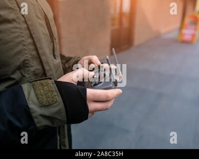 drone control panel in the hands of a man Stock Photo