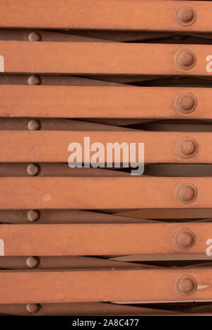 Close look at the collapsible gate and the rivets Stock Photo