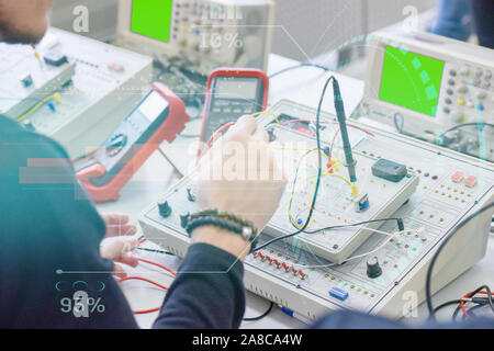 Two young students in technical vocational training, the lesson in technical college. Education and technology concept. Stock Photo