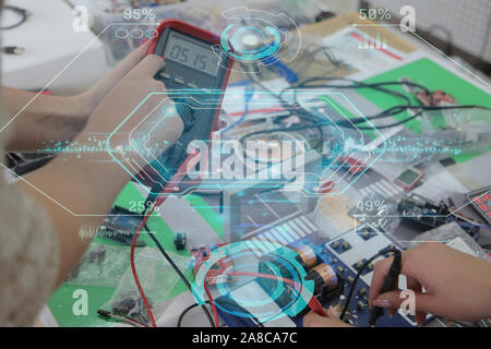 Two young students in technical vocational training, the lesson in technical college. Education and technology concept. Stock Photo