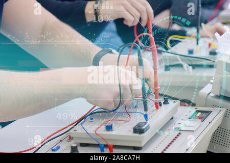 Two young students in technical vocational training, the lesson in technical college. Education and technology concept. Stock Photo
