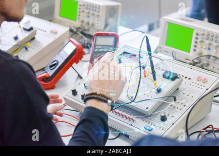 Two young students in technical vocational training, the lesson in technical college. Stock Photo
