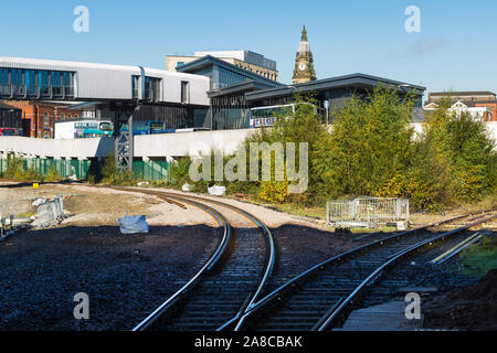 The new Bolton bus station and rail interchange, viewed here from the railway station and underneath the Trinity Street road bridge, opened in 2017 Stock Photo