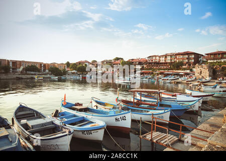 Nesebar, Bulgaria - July 20, 2014: Nesebar landscape with small fishing motorboats moored in old port Stock Photo