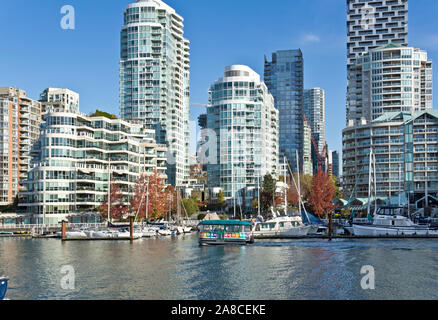 Vancouver condo buildings on the waterfront of False Creek.  Highrise apartment buildings in downtown Vancouver on False Creek. Stock Photo