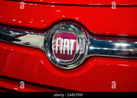 The Fiat logo on a red car of this brand Stock Photo