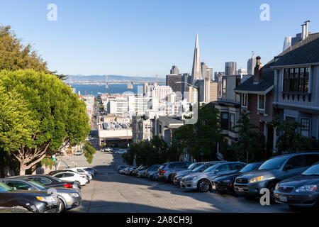 SAN FRANCISCO, USA -  OCTOBER 2, 2019 : City view of the Financial District and Oakland Bay Bridge from the top of the hill on Broadway in North Beach Stock Photo