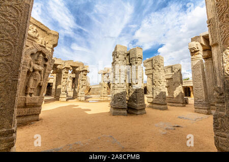 Beautifully carved stone pillars of Lepakshi Veerabhadra Temple, India. It was built in 16th century with profusion of carvings and paintings. Stock Photo