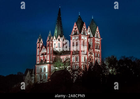 cathedral illuminated at the blue hour, Limburg an der Lahn, Germany Stock Photo