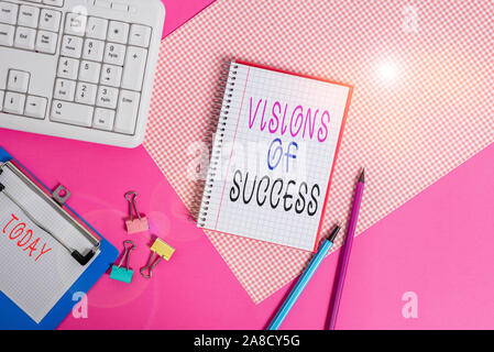 Conceptual hand writing showing Visions Of Success. Concept meaning Clear End Result of Purpose Goal Perspective Plan Writing equipments and computer Stock Photo