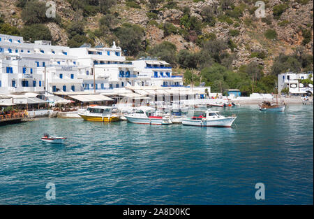 Loutro, Chania, Crete, Greece. View across harbour to the waterfront. Stock Photo