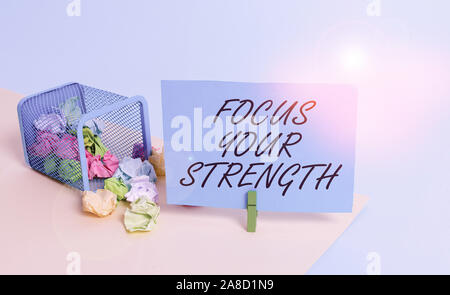 Writing note showing Focus Your Strength. Business concept for Improve skills work on weakness points think more Trash bin crumpled paper clothespin r Stock Photo