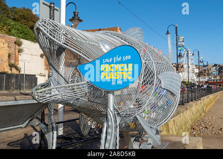 Unusual container bin for plastic waste bottle bottles garbage on the seafront Scarborough North Yorkshire England UK United Kingdom Great Britain Stock Photo