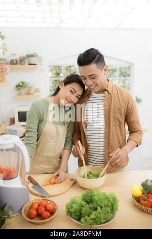 Young asian man and woman have romantic time while staying at home. Stock Photo